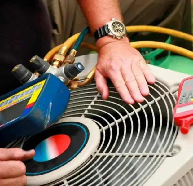 Technician inspecting clean HVAC system to enhance performance and efficiency